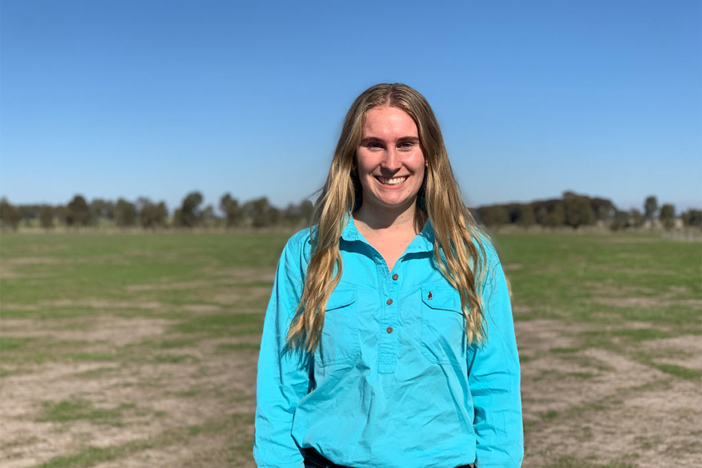 Natasha standing in a field